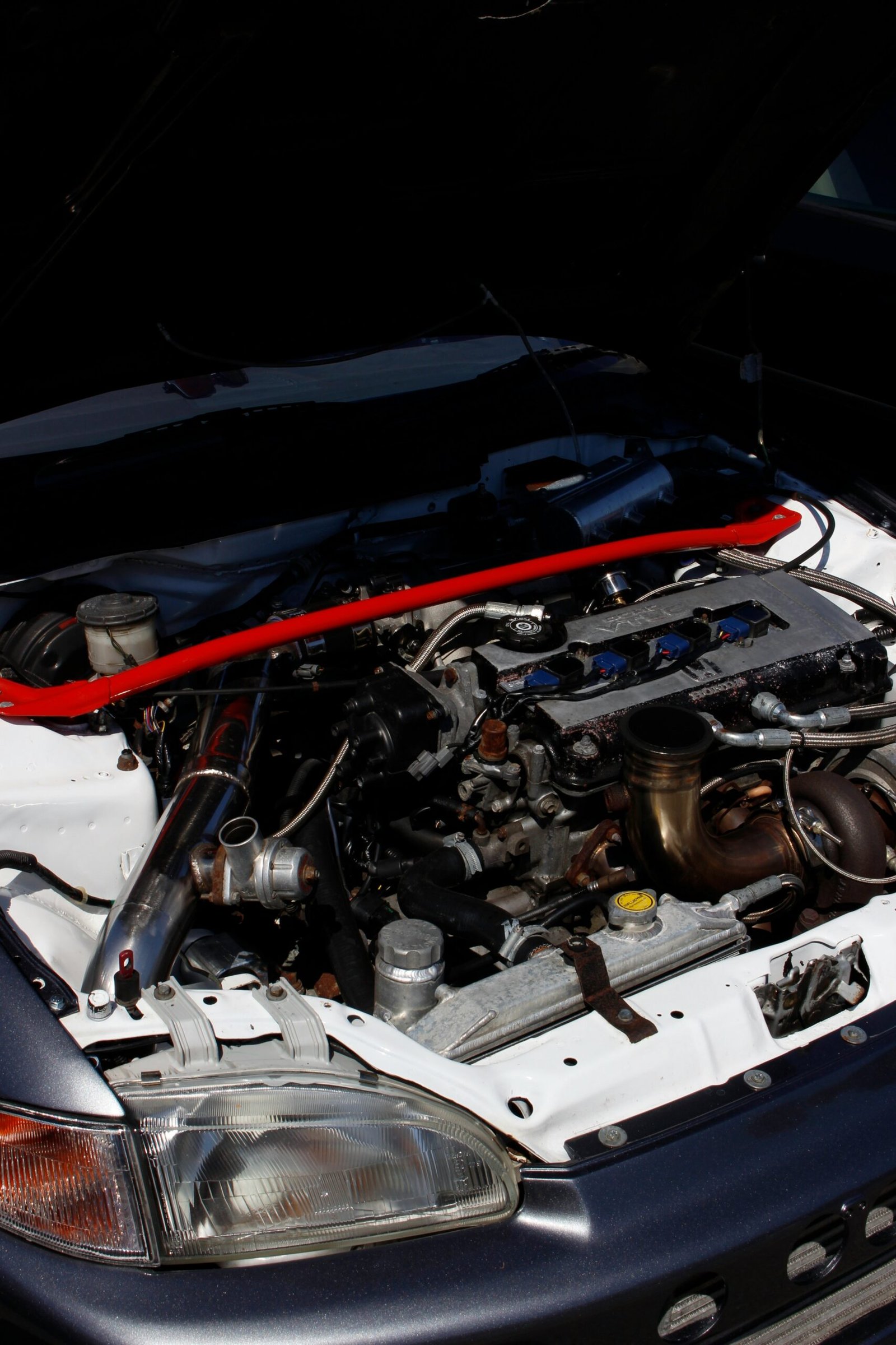 a car engine with its hood open